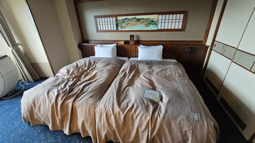 運河の宿 おたる ふる川 お部屋のベッド